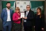 photo of Volunteer in Sport Award recipient, Jude Feehan of Offaly Community Games receiving his award from partner Fiona Shannon, and Offaly Sports Partnership staff, Liam O Reilly and Denise Coghill