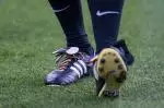 Sporting Pride #LetsGetVisible - image of football boots with rainbow laces
