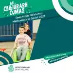 Boy in  wheelchair being pushed by a girl participating in sport for disability in sport week